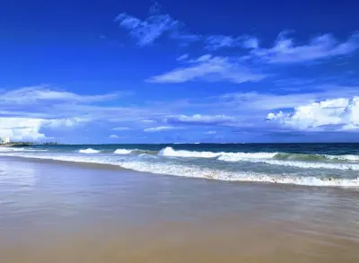 Isla Verde – Pine Grove in Carolina, Puerto Rico - with surfing waves